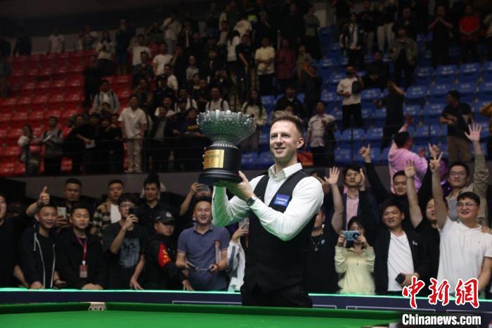 特鲁姆普10-4击败丁俊晖夺